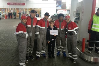 Lukoil drivers and footballers attend petrol station